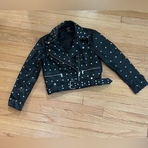 Forever 21 faux leather motorcycle jacket with silver grommets.